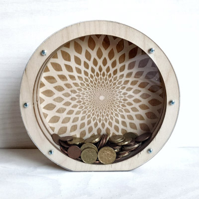 handmade wooden bank with repeating design